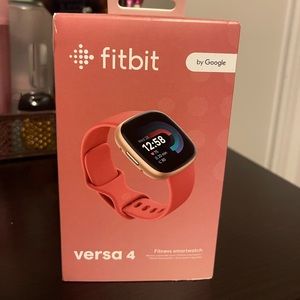 Brand new in box Fitbit Versa 4 with Pink Sand band
